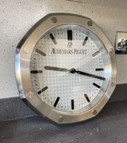 Luxurious stainless steel wall clock based on silver bezel and white face and black dial